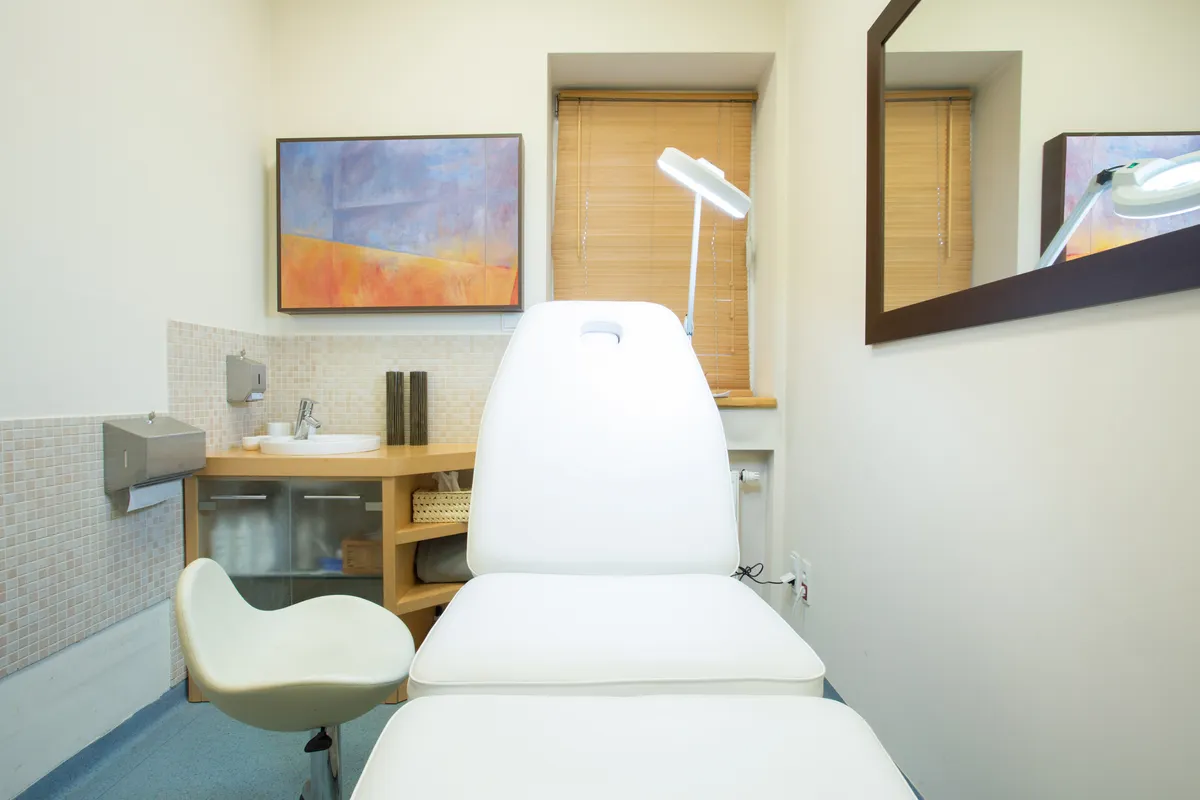 Photo of white treatment couch in intervention room